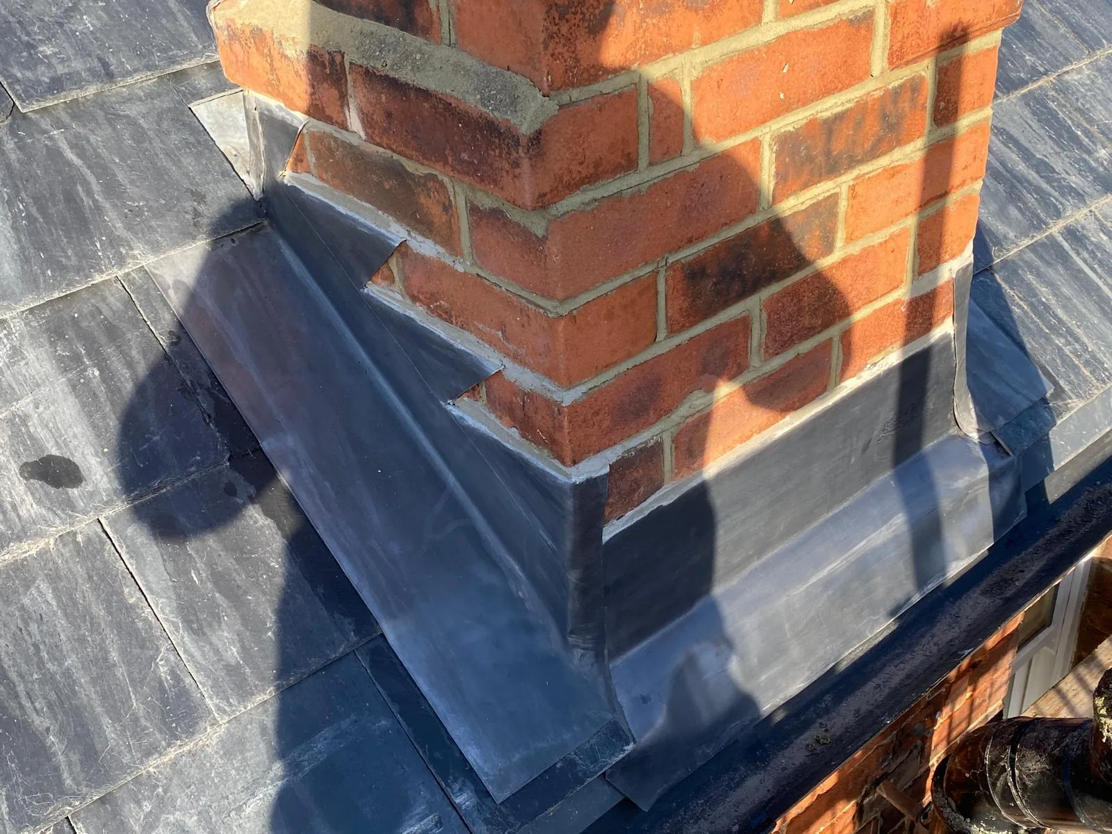 Chimney re-lead and re-point